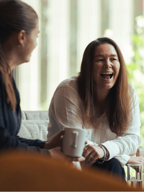 Two women laughing