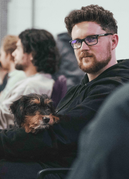 Man sitting with doggo