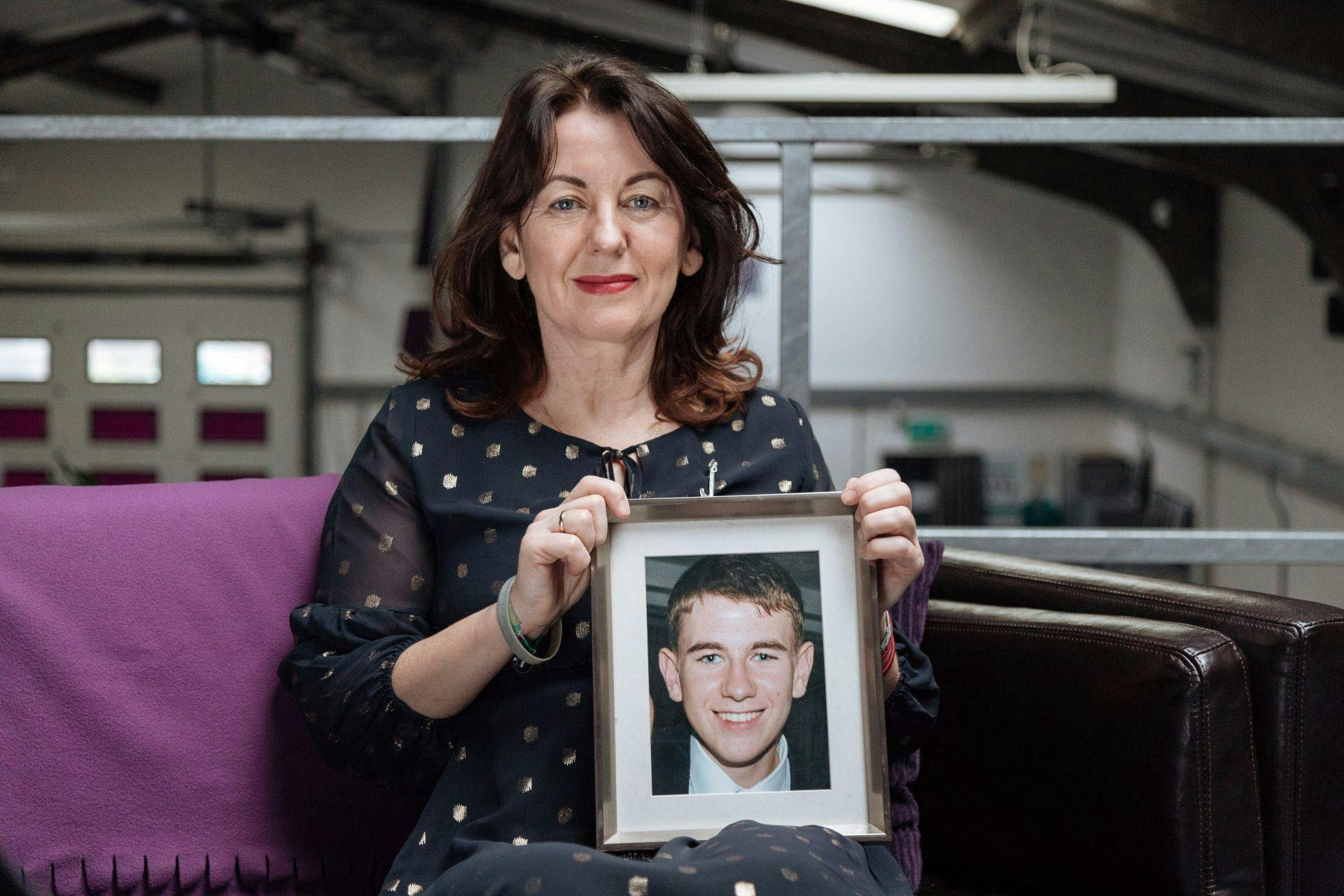 Frances Molloy with a picture of Michael.